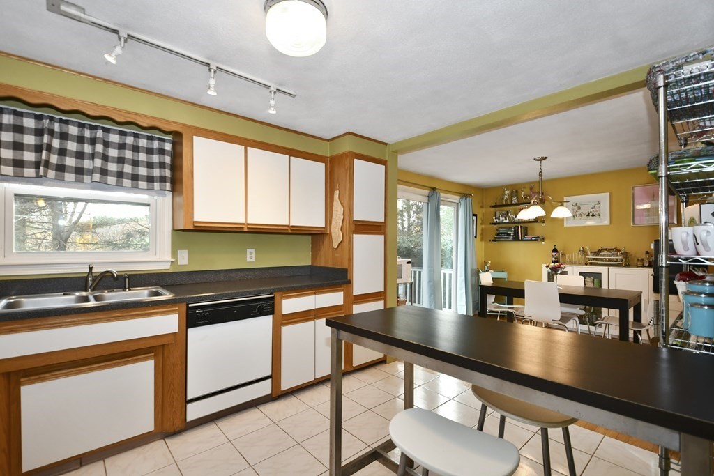 14 Oak Ridge Way Shrewsbury, MA 01545 - Photo 8 of 30 a kitchen with stainless steel appliances granite countertop a sink and a stove