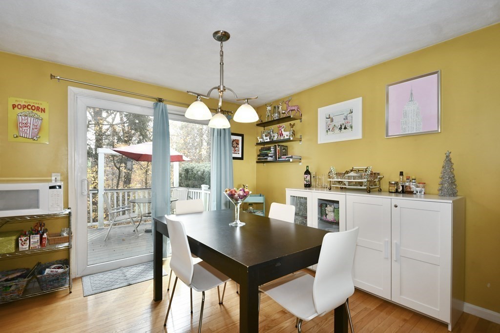 14 Oak Ridge Way Shrewsbury, MA 01545 - Photo 10 of 30 a view of a dining room with furniture window and wooden floor