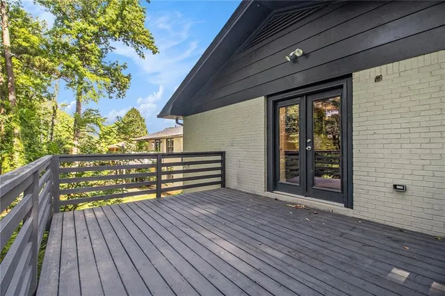 a view of outdoor space with wooden floor and outdoor seating
