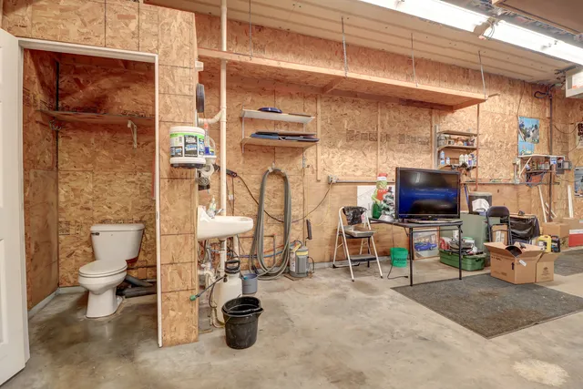 a view of a patio with table and chairs