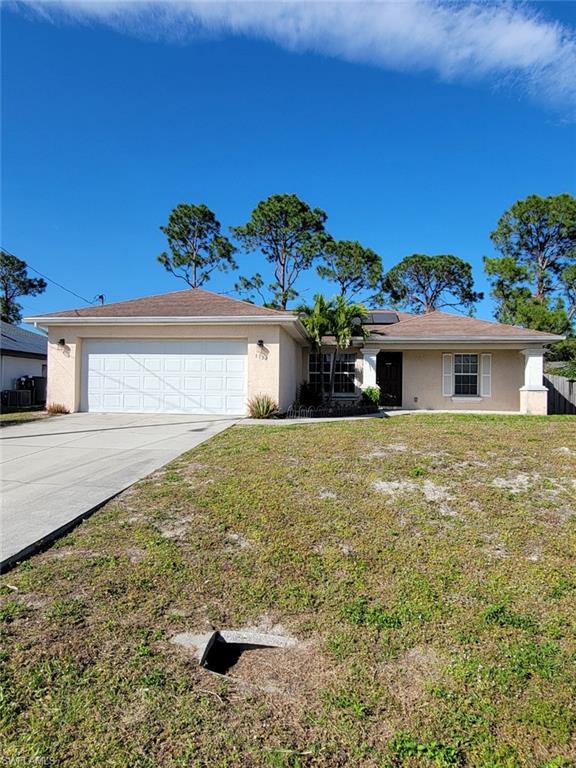 a view of house with outdoor space