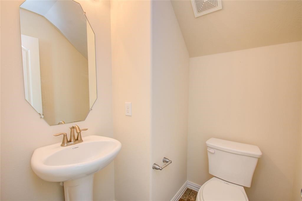 5136 Gable Lane Houston, TX 77066 - Photo 15 of 25 A powder room is conveniently located on the first floor.