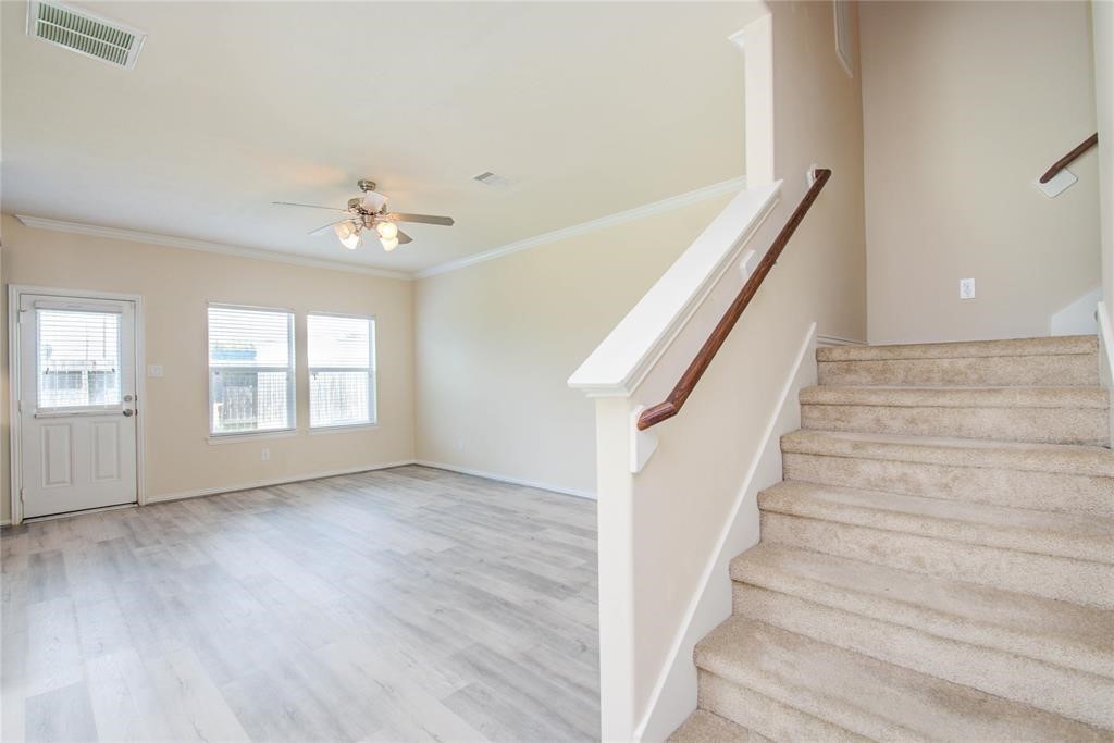 5136 Gable Lane Houston, TX 77066 - Photo 8 of 25 Carpeted stairs lead you to the bedrooms located upstairs.