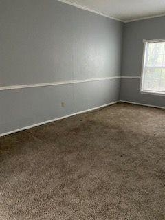 3366 South 7th Street Abilene, TX 79605 - Photo 12 of 16 an empty room with a window
