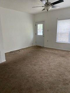 3366 South 7th Street Abilene, TX 79605 - Photo 2 of 16 an empty room with a window