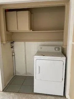 a utility room with a washer and dryer