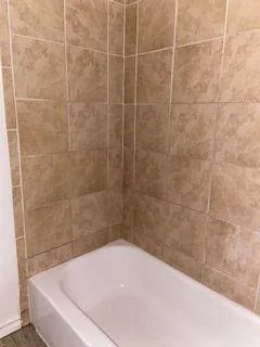 a bathroom with a bathtub