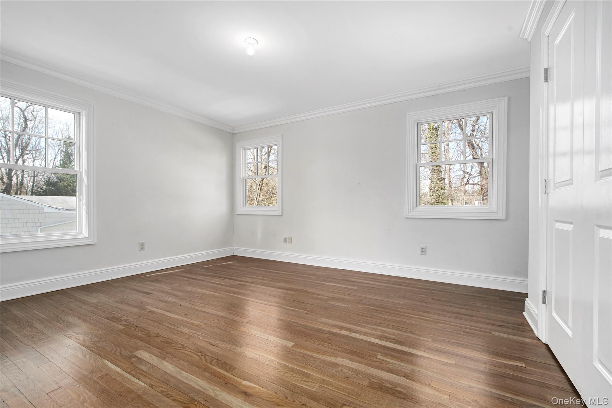 8 Walden Lane Rye, NY 10580 - Photo 17 of 28 Spare room featuring dark wood finished floors