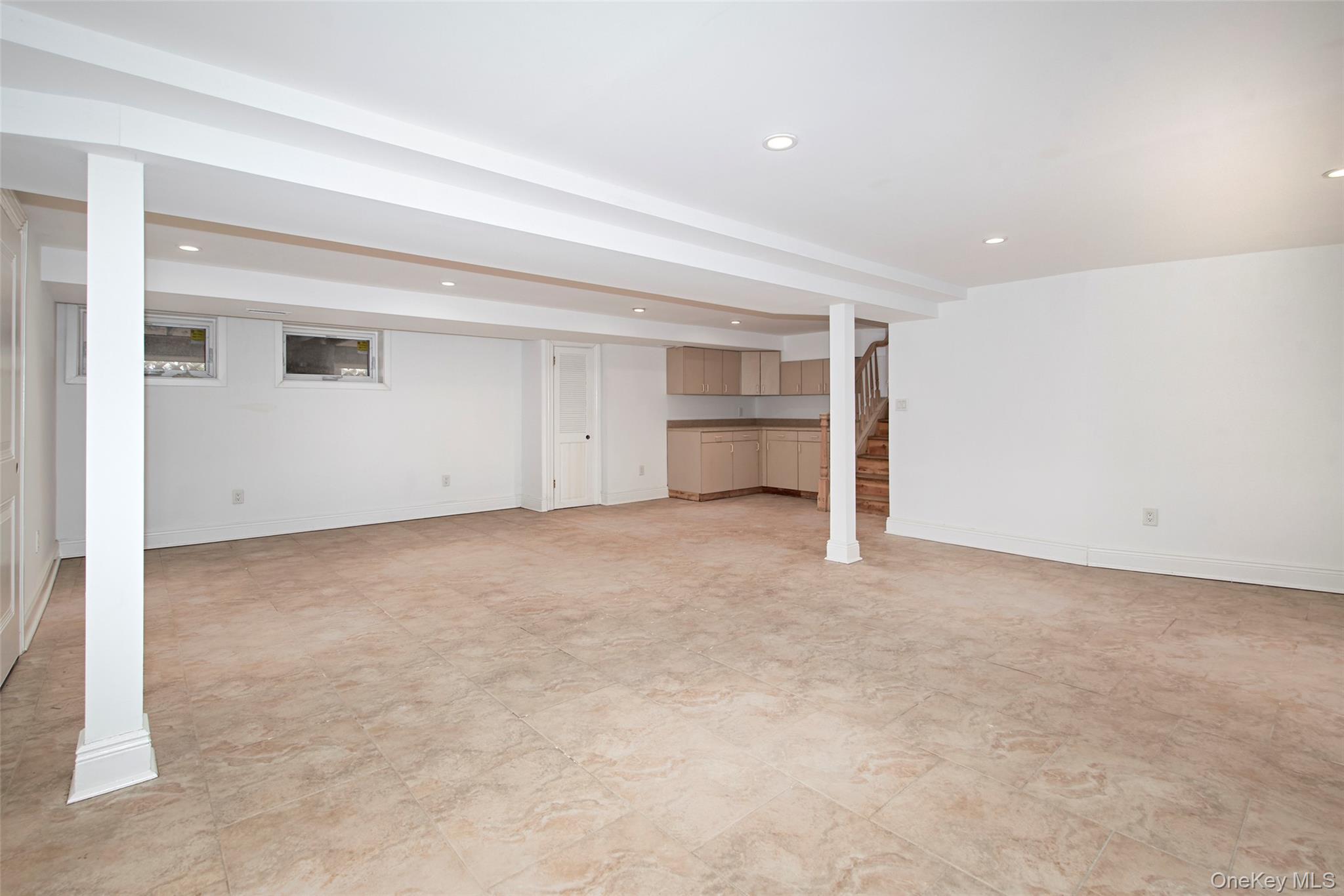 8 Walden Lane Rye, NY 10580 - Photo 20 of 28 Finished lower level with recessed lighting makes the perfect exercise, au pair or playroom