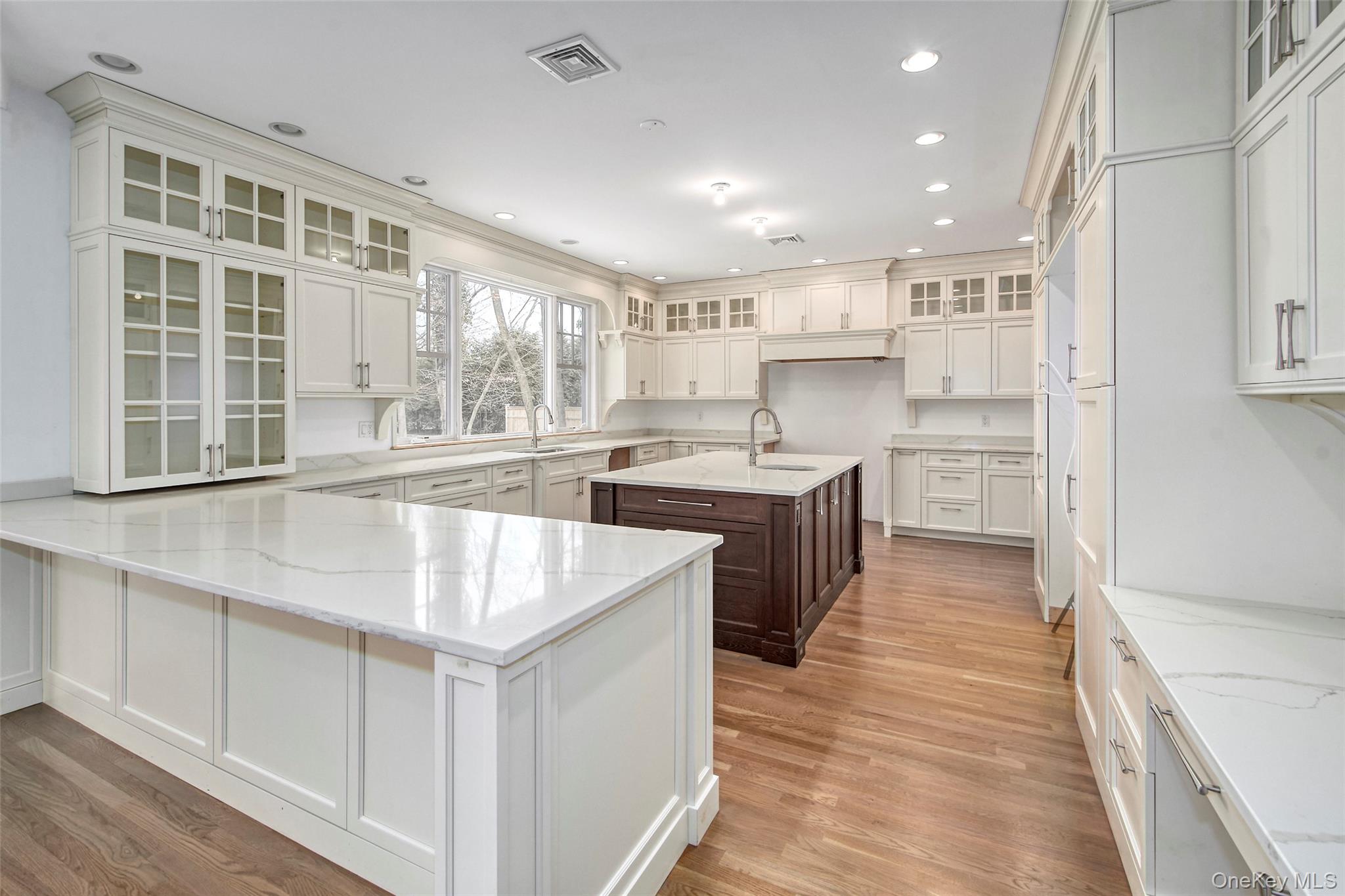 8 Walden Lane Rye, NY 10580 - Photo 5 of 28 Chefs kitchen with hardwood floors, custom cabinets and breakfast nook