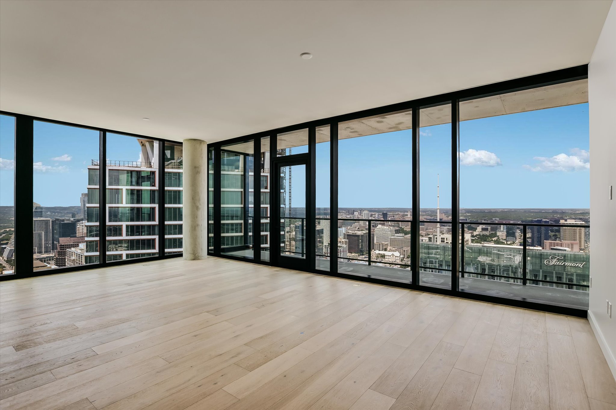 610 Davis Street, Unit 4704 Austin, TX 78701 - Photo 8 of 40 wooden floor with windows and city view