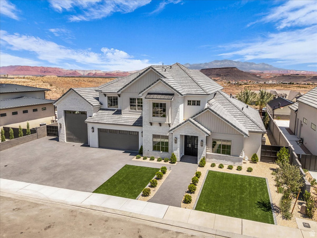 1620 Belayer Drive St. George, UT 84770 - Photo 6 of 51 Contemporary residence featuring a white brick exterior and a gray tile roof