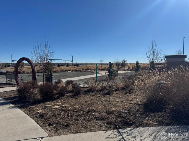 a picture of a kitchen with a refrigerator