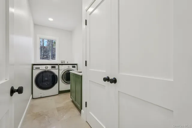 a utility room with dryer and washer