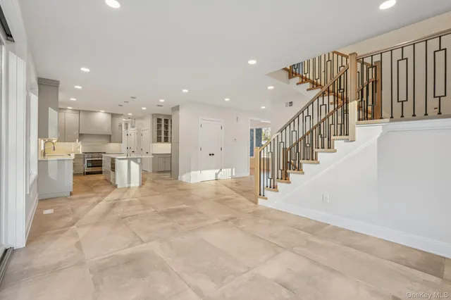 a view of a kitchen with furniture and a kitchen