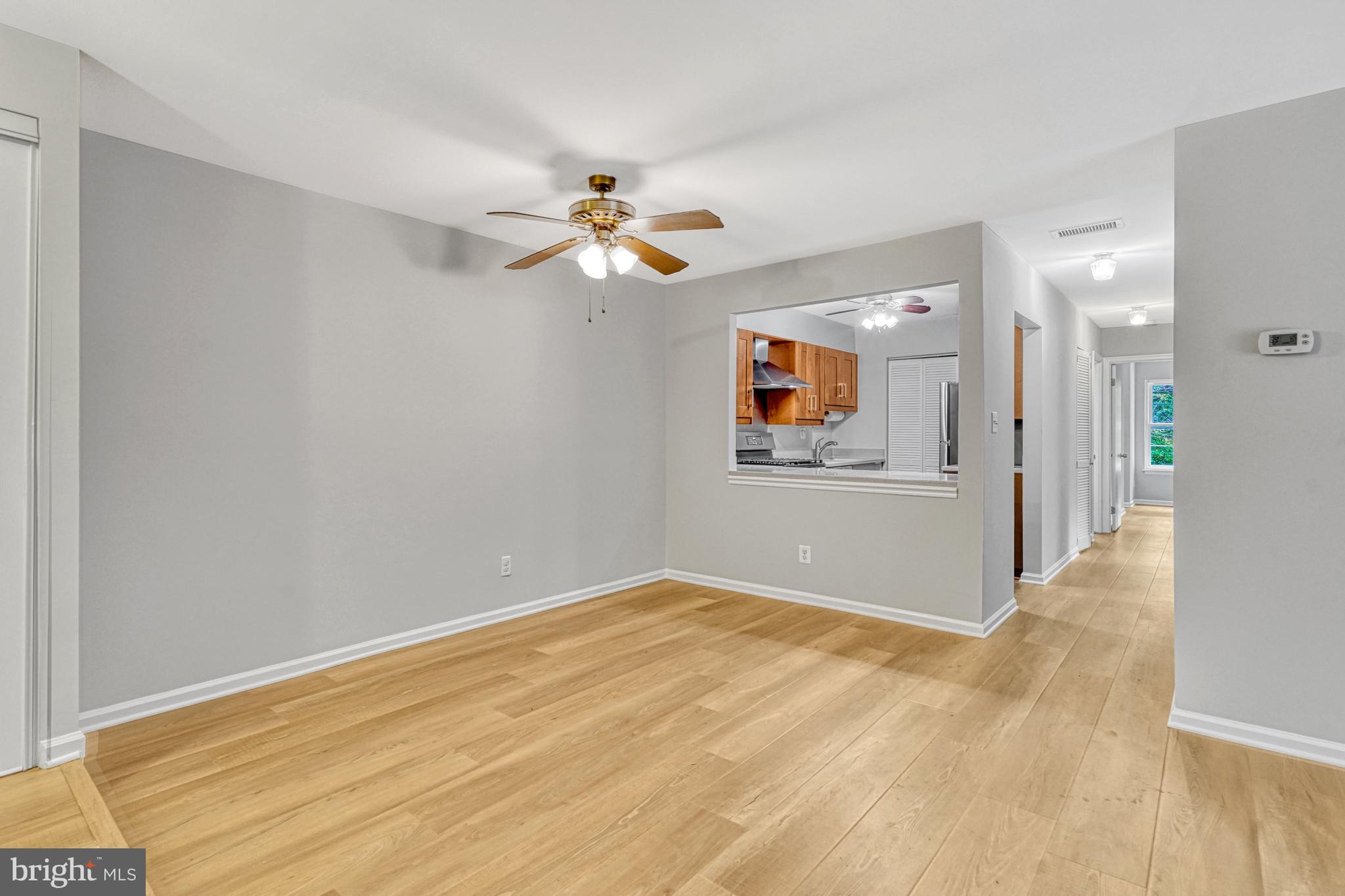 5815 Cove Landing Road, Unit 204 Burke, VA 22015 - Photo 10 of 39 dining area, hall to bedrooms