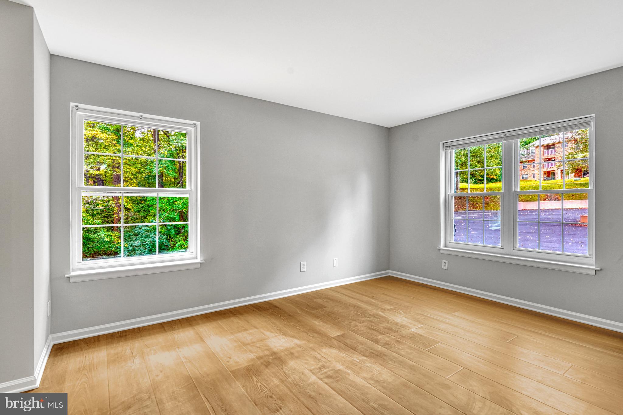 5815 Cove Landing Road, Unit 204 Burke, VA 22015 - Photo 24 of 39 primary bed, lots of natural light