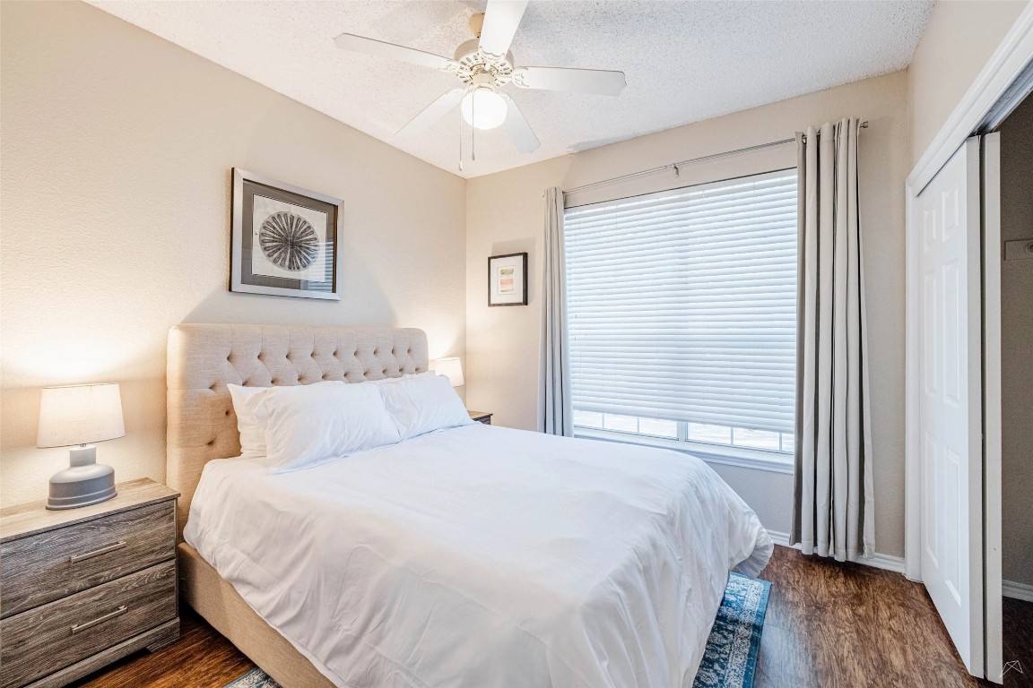 11908 Anderson Mill Road, Unit 732 Austin, TX 78726 - Photo 15 of 23 a bedroom with a bed and a window