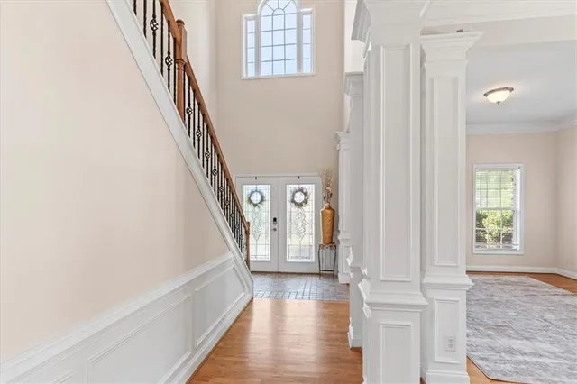 a view of entryway with wooden floor