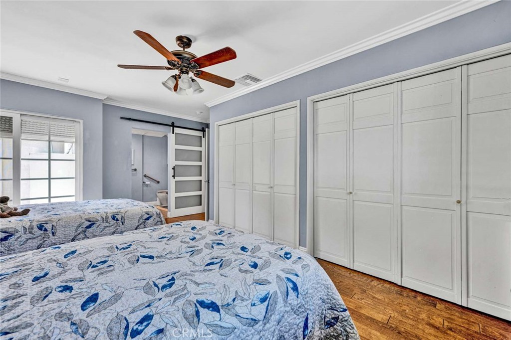 5456 Cadbury Road Whittier, CA 90601 - Photo 48 of 67 a bedroom with a large bed and a window