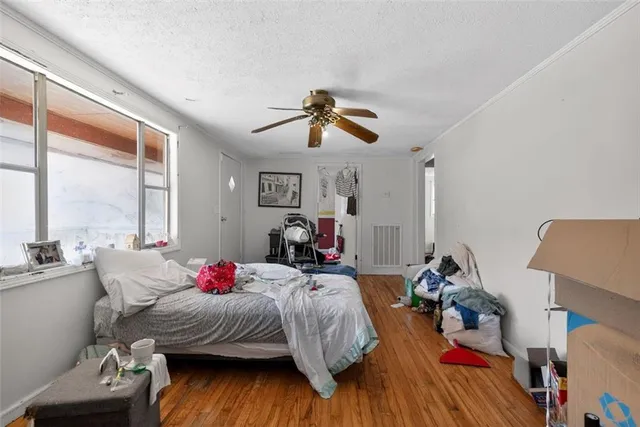 a bedroom with furniture and a bed