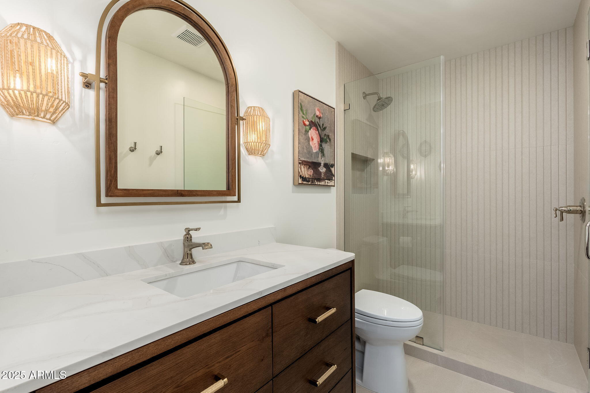 4030 East Fairmount Avenue Phoenix, AZ 85018 - Photo 11 of 23 a bathroom with a sink a toilet and shower