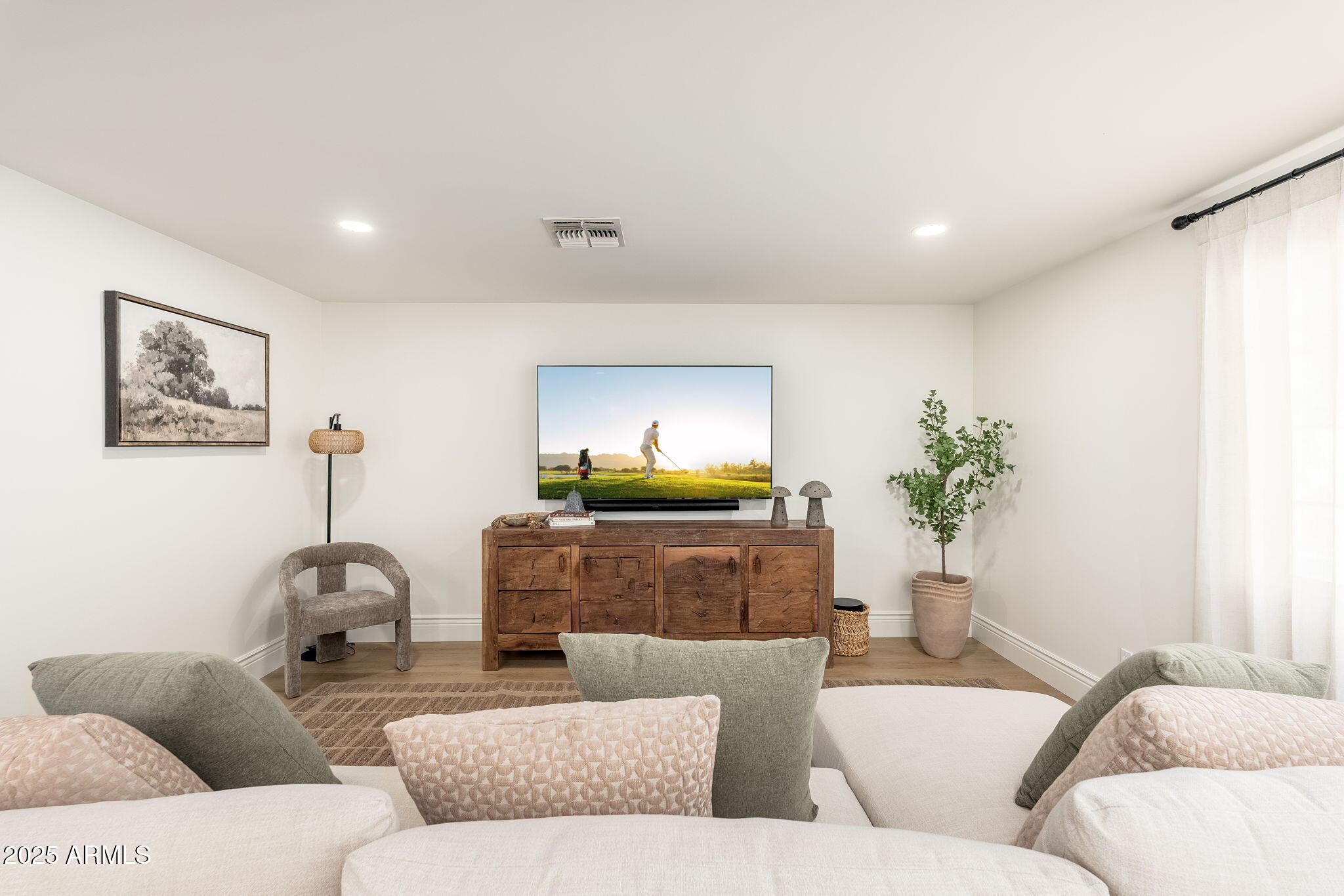 4030 East Fairmount Avenue Phoenix, AZ 85018 - Photo 17 of 23 a living room with furniture and a couch