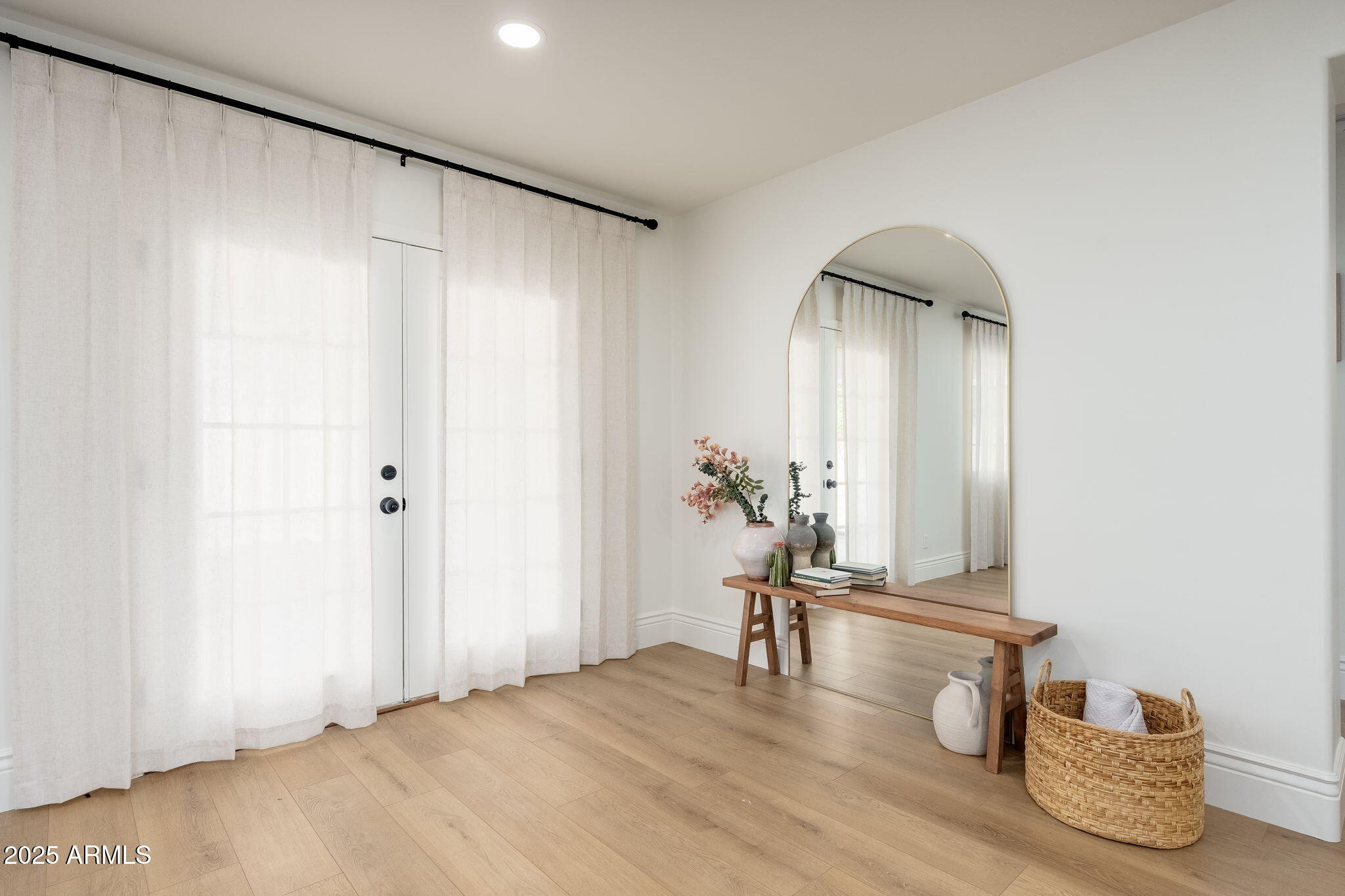 4030 East Fairmount Avenue Phoenix, AZ 85018 - Photo 7 of 23 a view of empty room with wooden floor