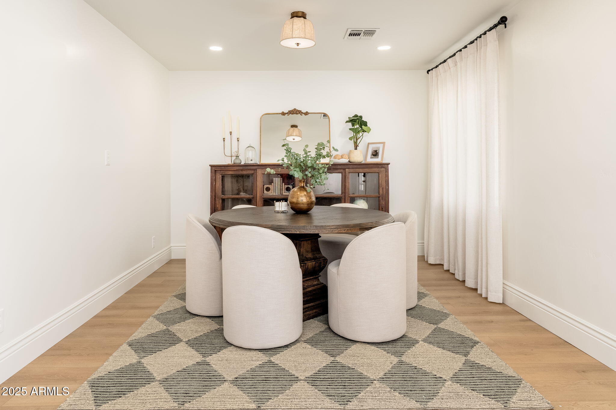4030 East Fairmount Avenue Phoenix, AZ 85018 - Photo 8 of 23 a view of a kitchen with natural light