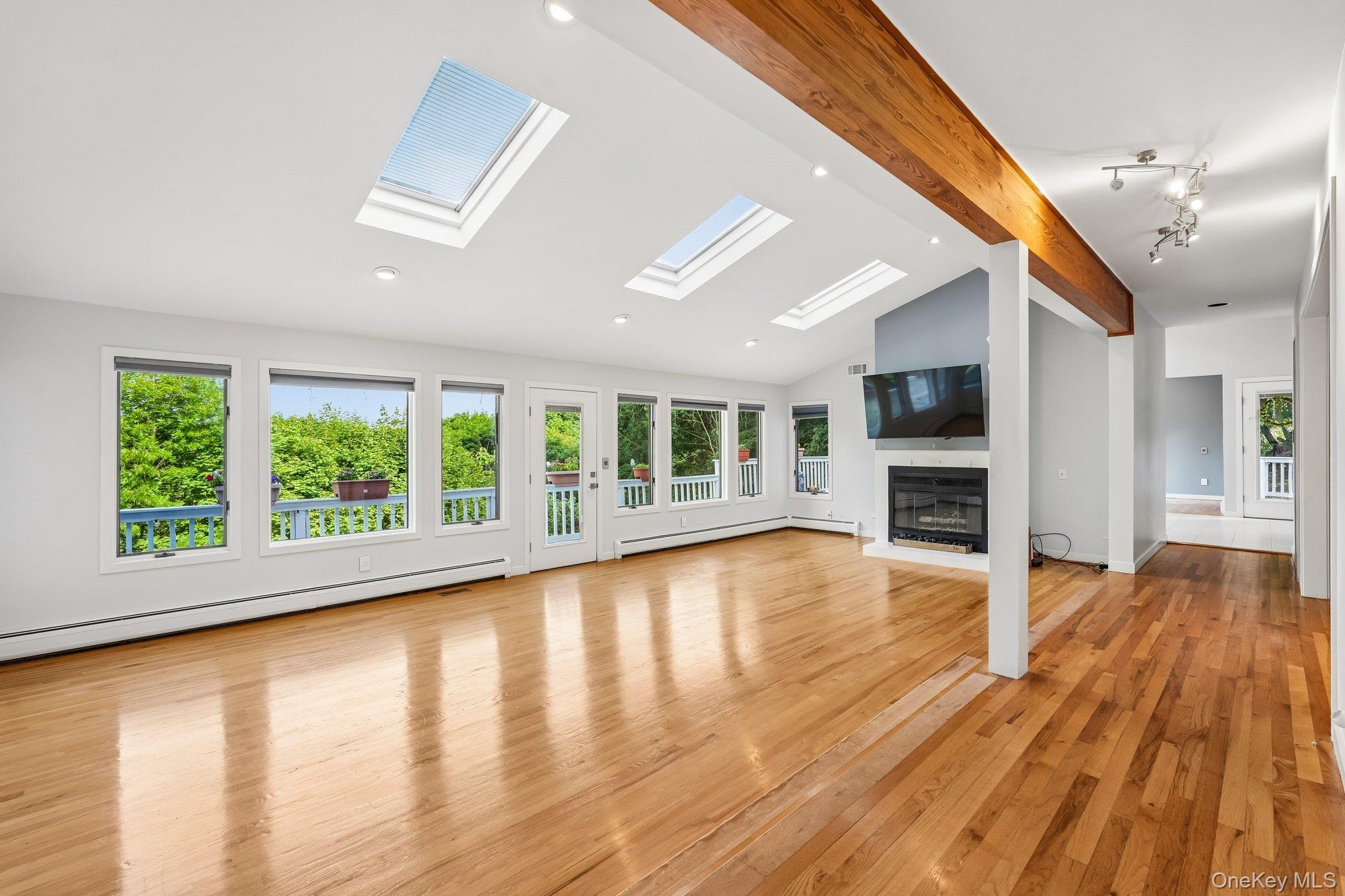 1150 Rte 9W Nyack, NY 10960 - Photo 5 of 49 An open-concept living room under a skylight