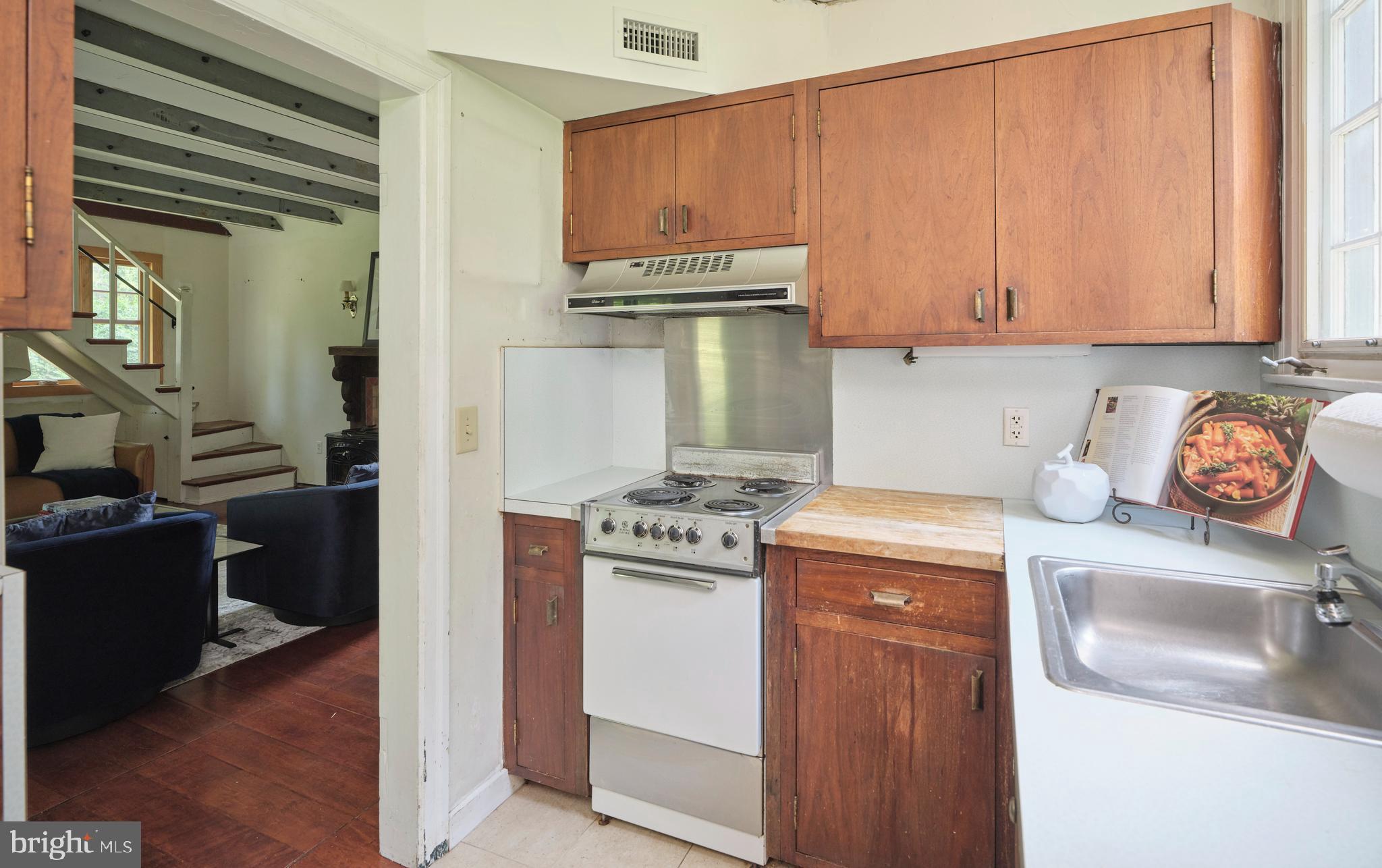 2598 River Road New Hope, PA 18938 - Photo 17 of 28 a kitchen with a stove and a refrigerator
