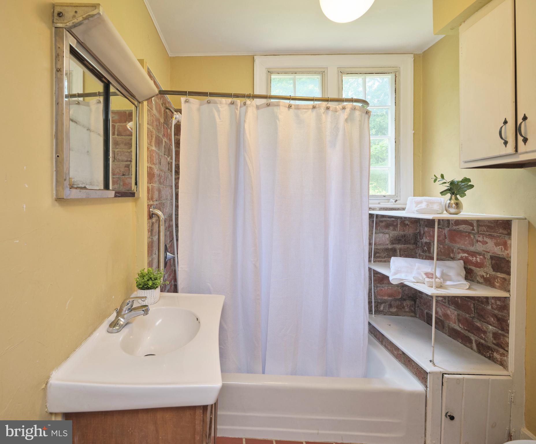 2598 River Road New Hope, PA 18938 - Photo 20 of 28 a bathroom with a shower and a sink