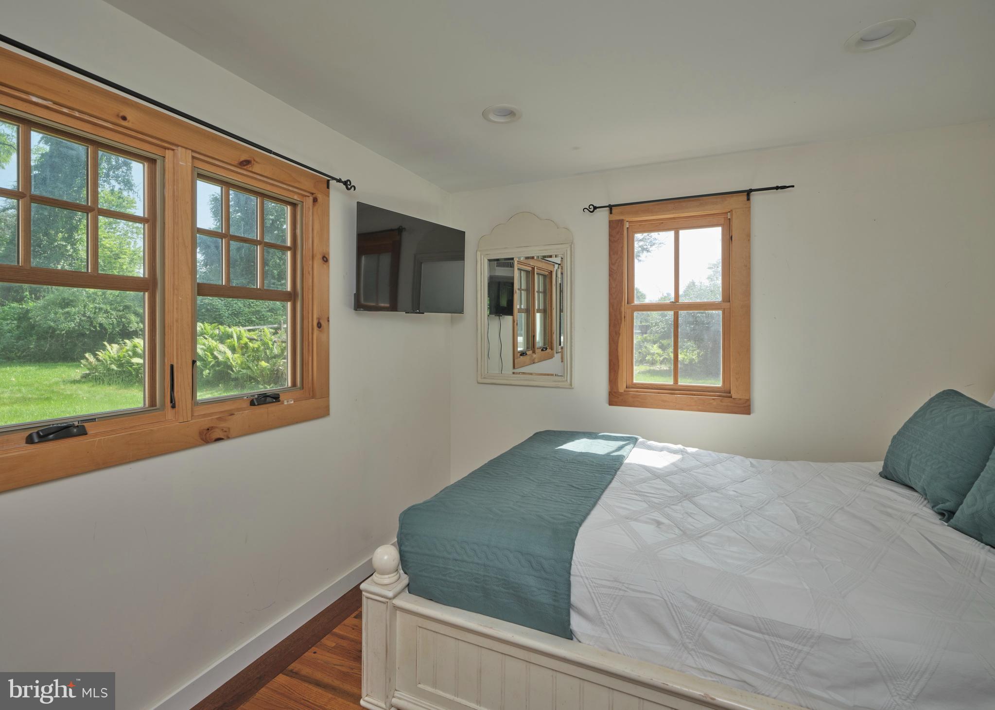 2598 River Road New Hope, PA 18938 - Photo 21 of 28 a bedroom with a bed and a window