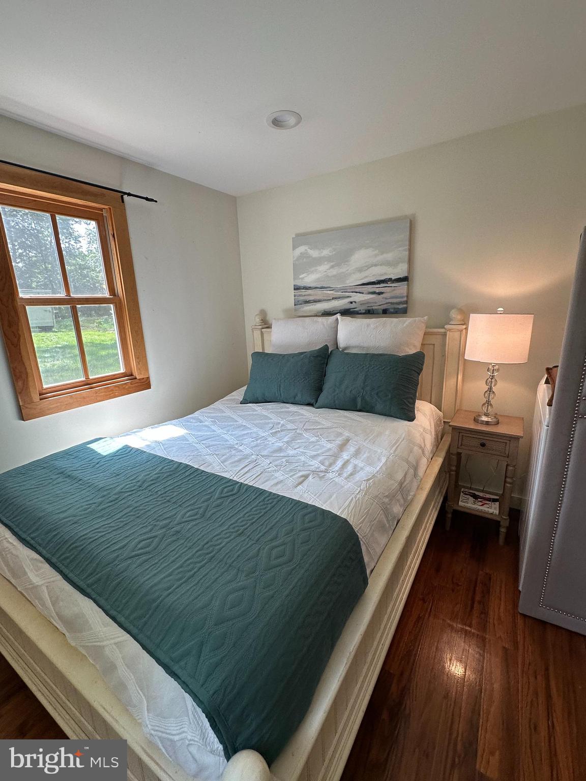 2598 River Road New Hope, PA 18938 - Photo 23 of 28 a bedroom with a bed and wooden floor