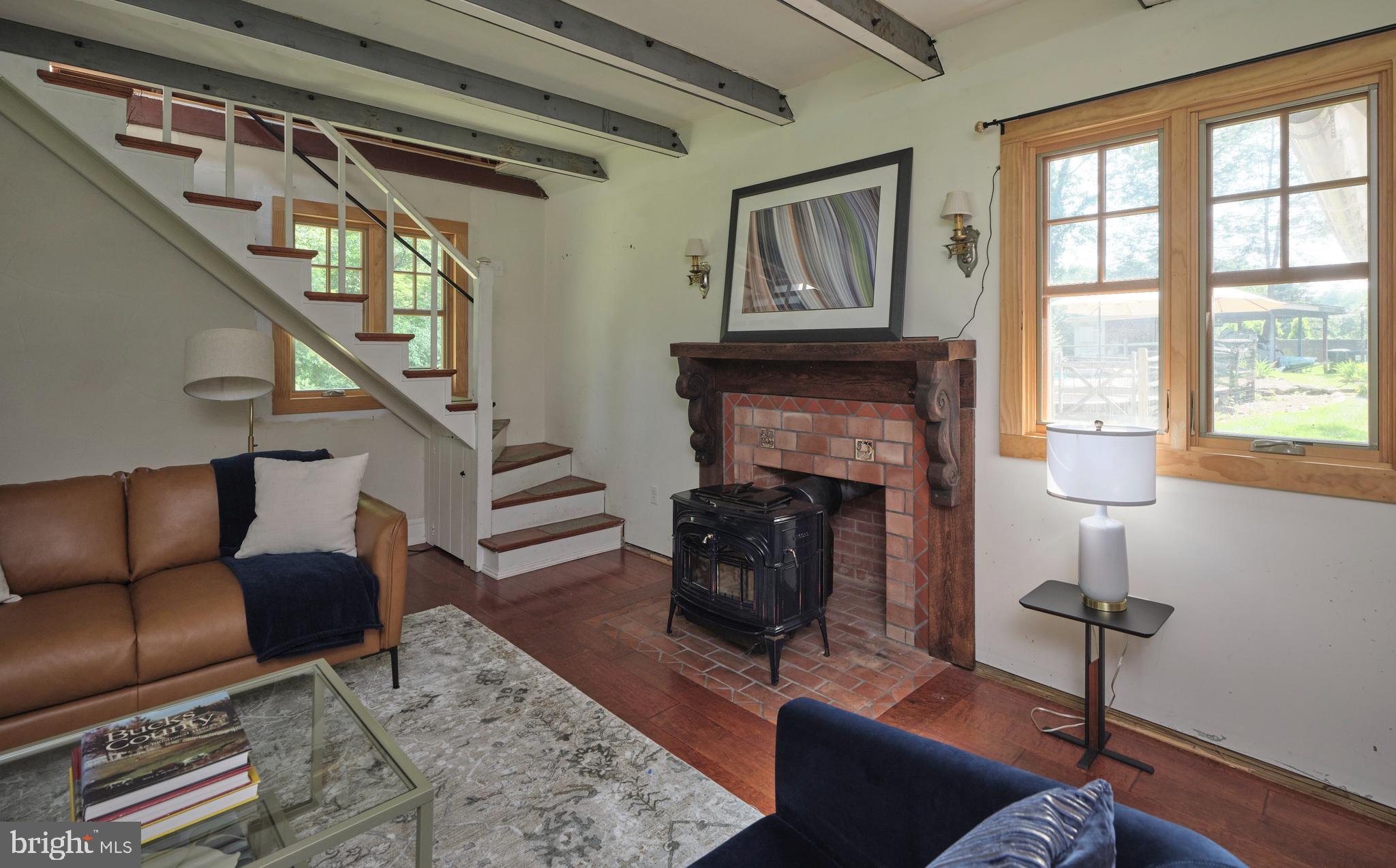 2598 River Road New Hope, PA 18938 - Photo 10 of 28 a living room with furniture and a fireplace