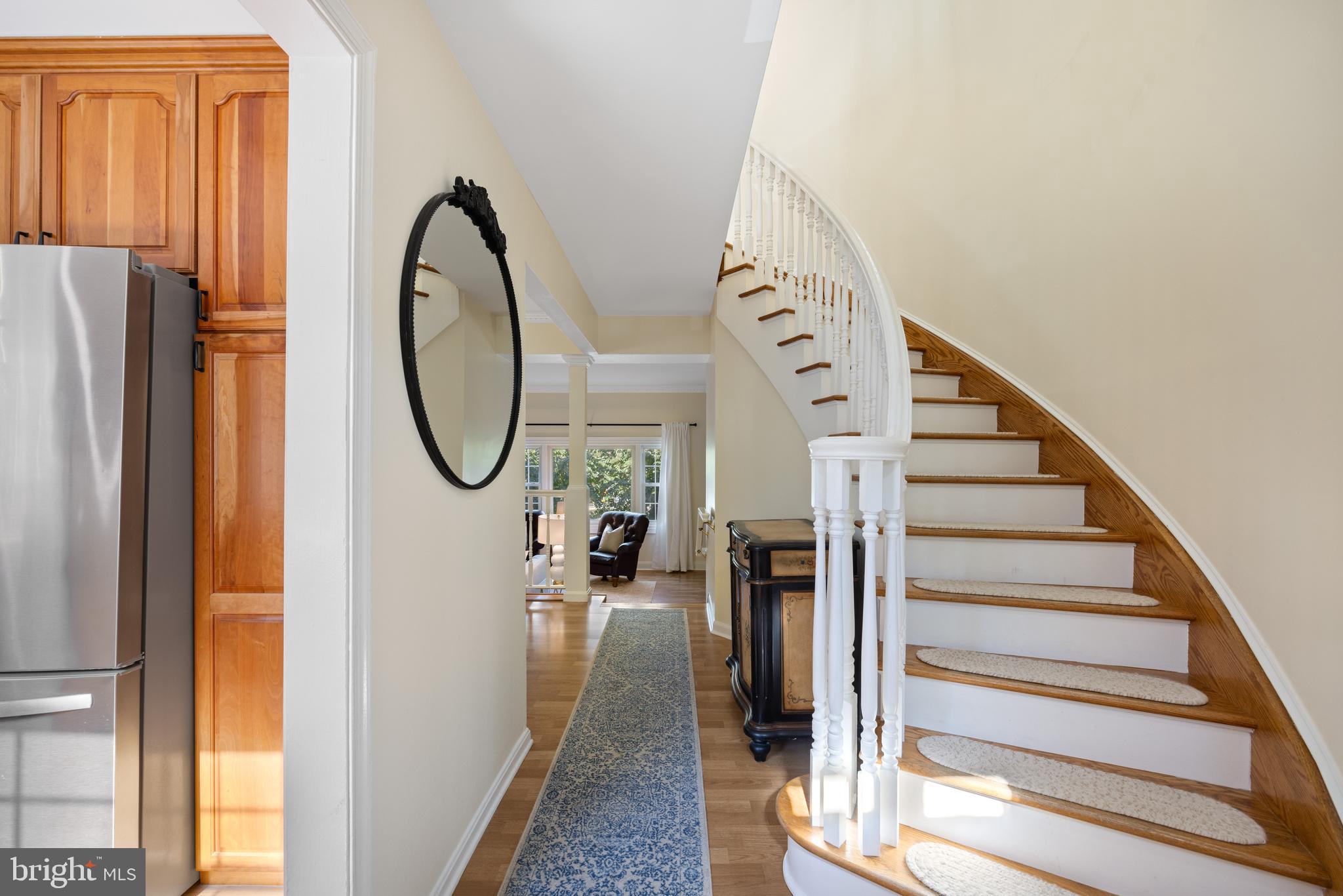 8522 Westover Court Springfield, VA 22152 - Photo 20 of 50 Curved Stairway lead to Upper Level