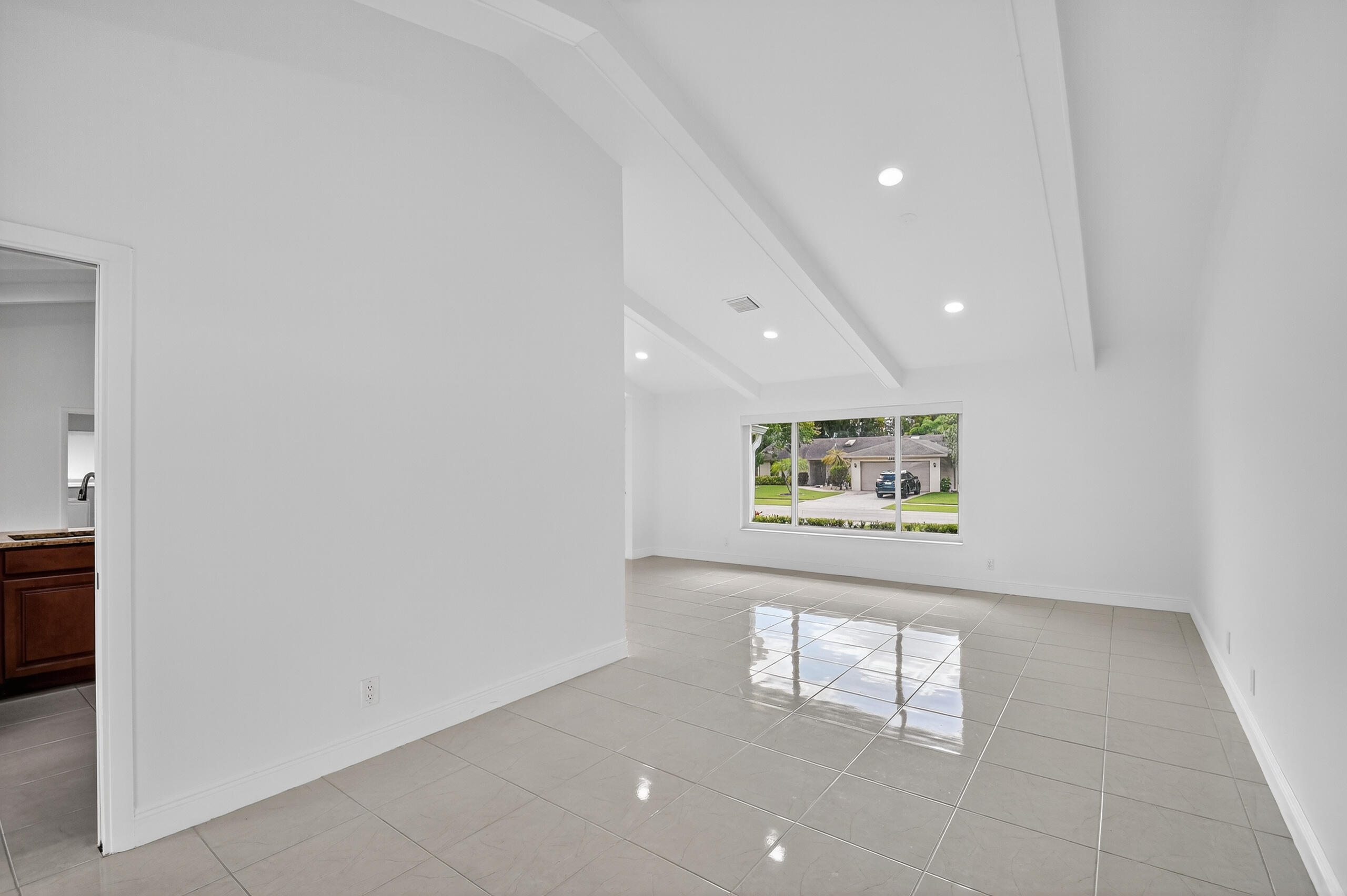 1877 Shower Tree Way Wellington, FL 33414 - Photo 11 of 53 a view of an empty room with a window