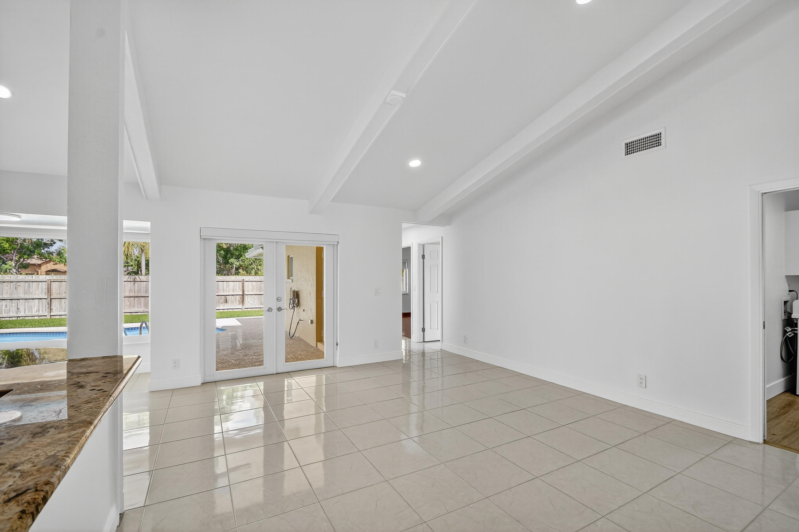 1877 Shower Tree Way Wellington, FL 33414 - Photo 20 of 53 a view of an empty room with a window