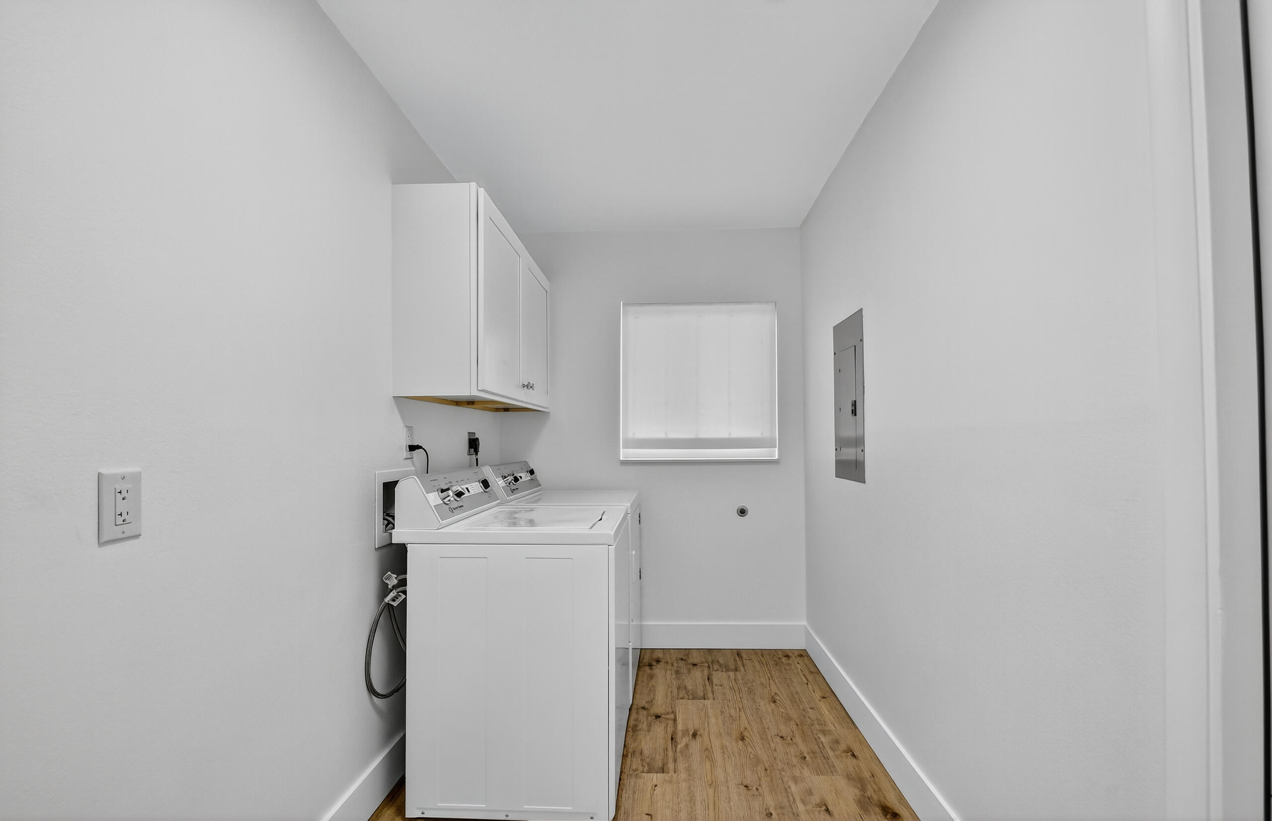 1877 Shower Tree Way Wellington, FL 33414 - Photo 23 of 53 a room with a sink and cabinets