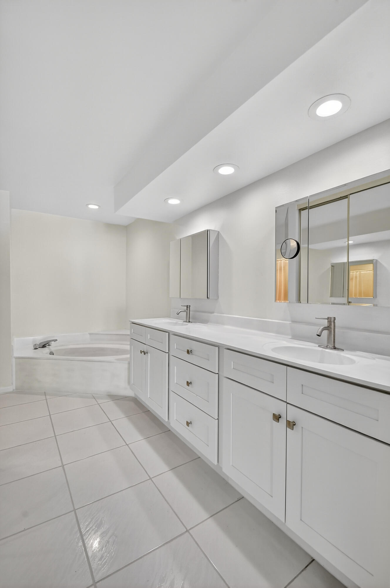 1877 Shower Tree Way Wellington, FL 33414 - Photo 28 of 53 a spacious bathroom with a granite countertop sink mirror and