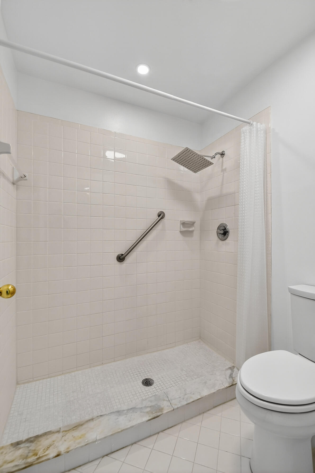 1877 Shower Tree Way Wellington, FL 33414 - Photo 31 of 53 a bathroom with a shower and a toilet
