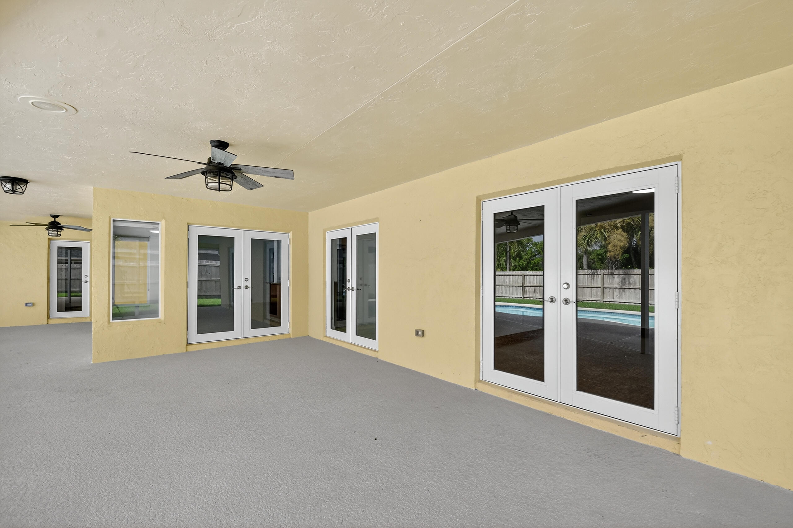 1877 Shower Tree Way Wellington, FL 33414 - Photo 49 of 53 a view of an empty room with a window