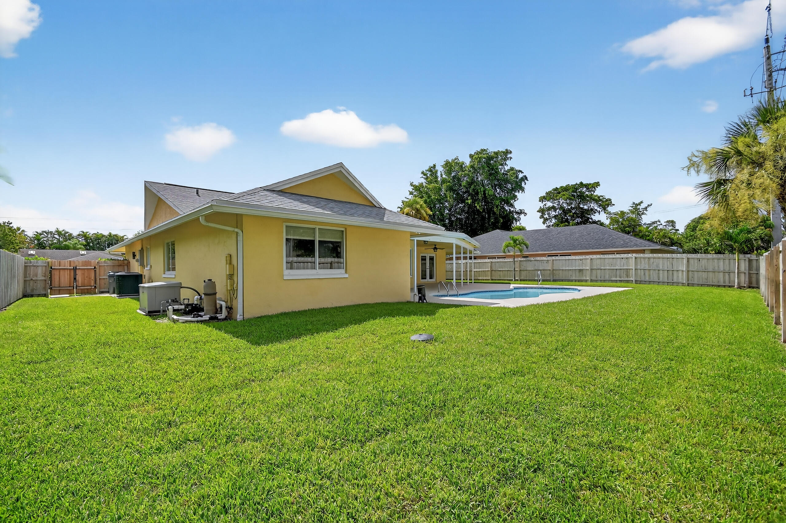 1877 Shower Tree Way Wellington, FL 33414 - Photo 51 of 53 a view of outdoor space and yard
