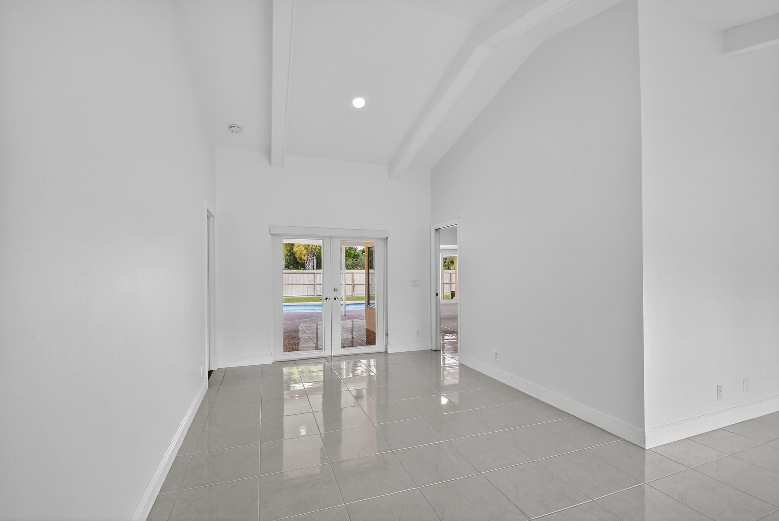 1877 Shower Tree Way Wellington, FL 33414 - Photo 9 of 53 a view of an empty room and window