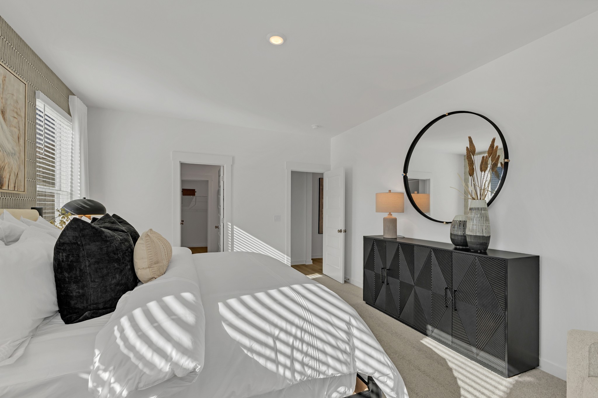 6356 North New Hope Road Hermitage, TN 37076 - Photo 15 of 37 a bedroom with bed and a mirror