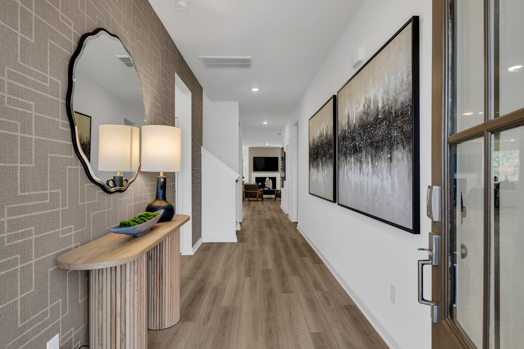 6356 North New Hope Road Hermitage, TN 37076 - Photo 2 of 37 a view of a hallway with wooden floor and staircase