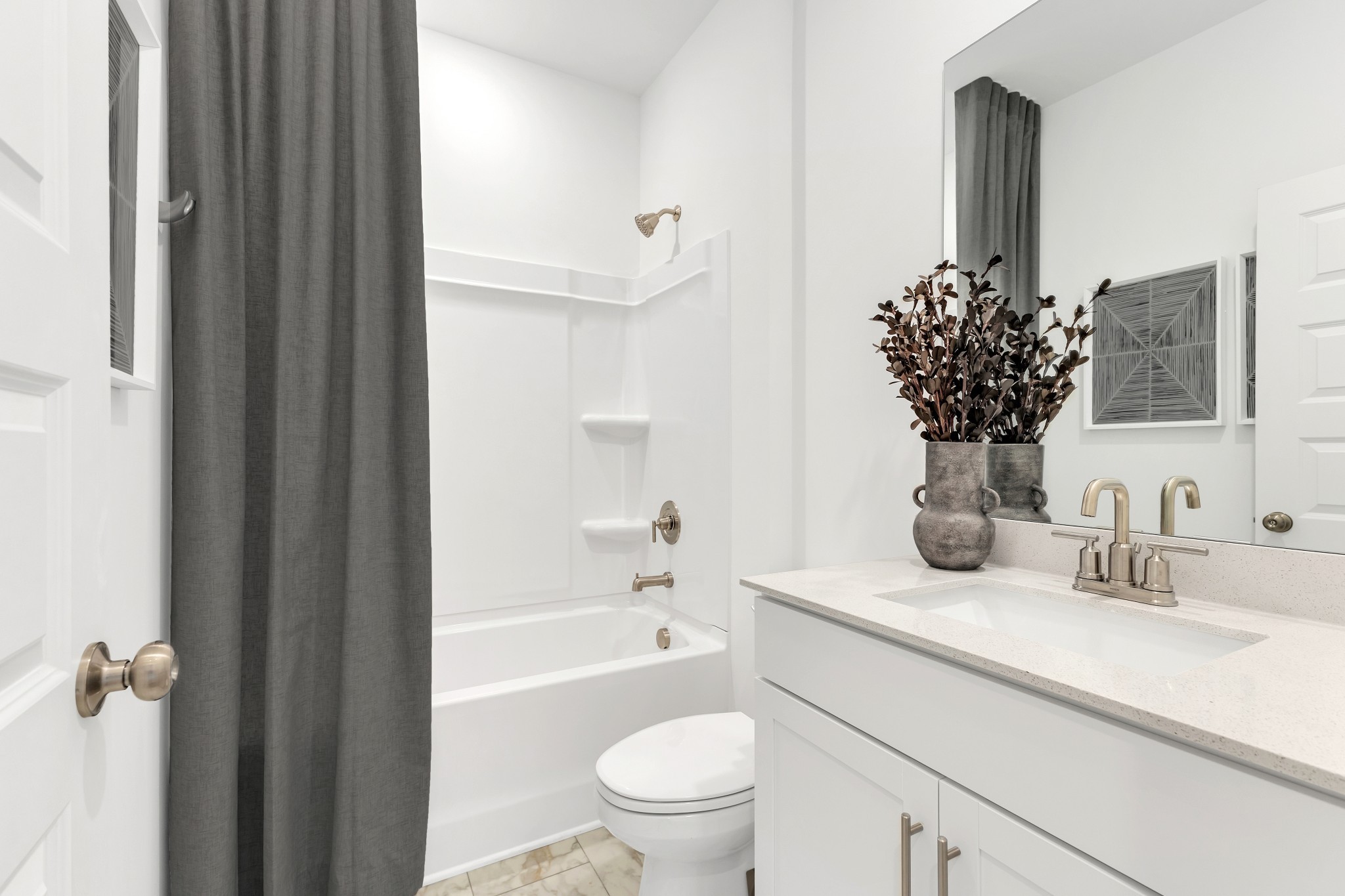 6356 North New Hope Road Hermitage, TN 37076 - Photo 21 of 37 a bathroom with a granite countertop sink a toilet and a bathtub
