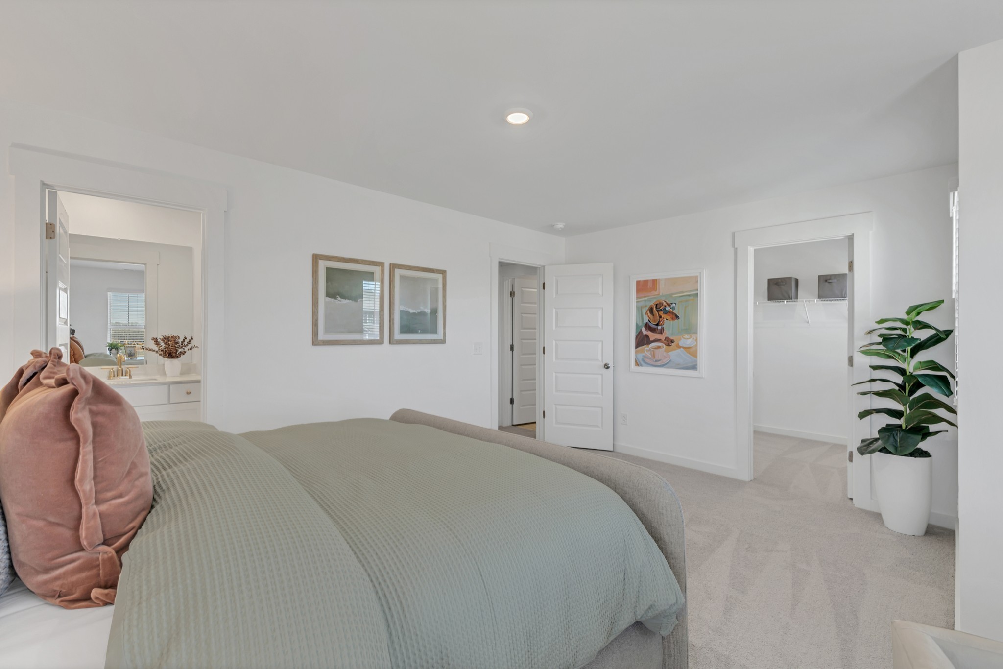 6356 North New Hope Road Hermitage, TN 37076 - Photo 28 of 37 a bedroom with a bed and a potted plant