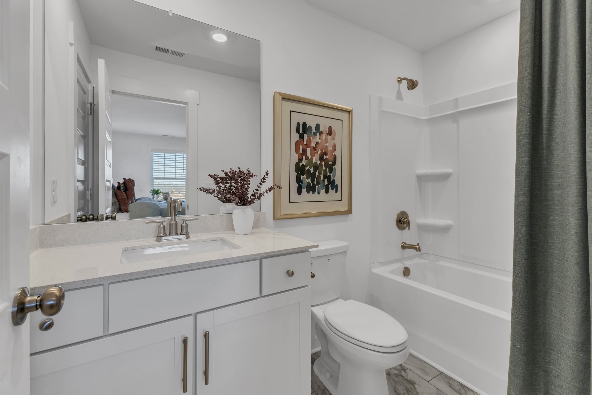6356 North New Hope Road Hermitage, TN 37076 - Photo 29 of 37 a bathroom with a toilet a sink and a bathtub