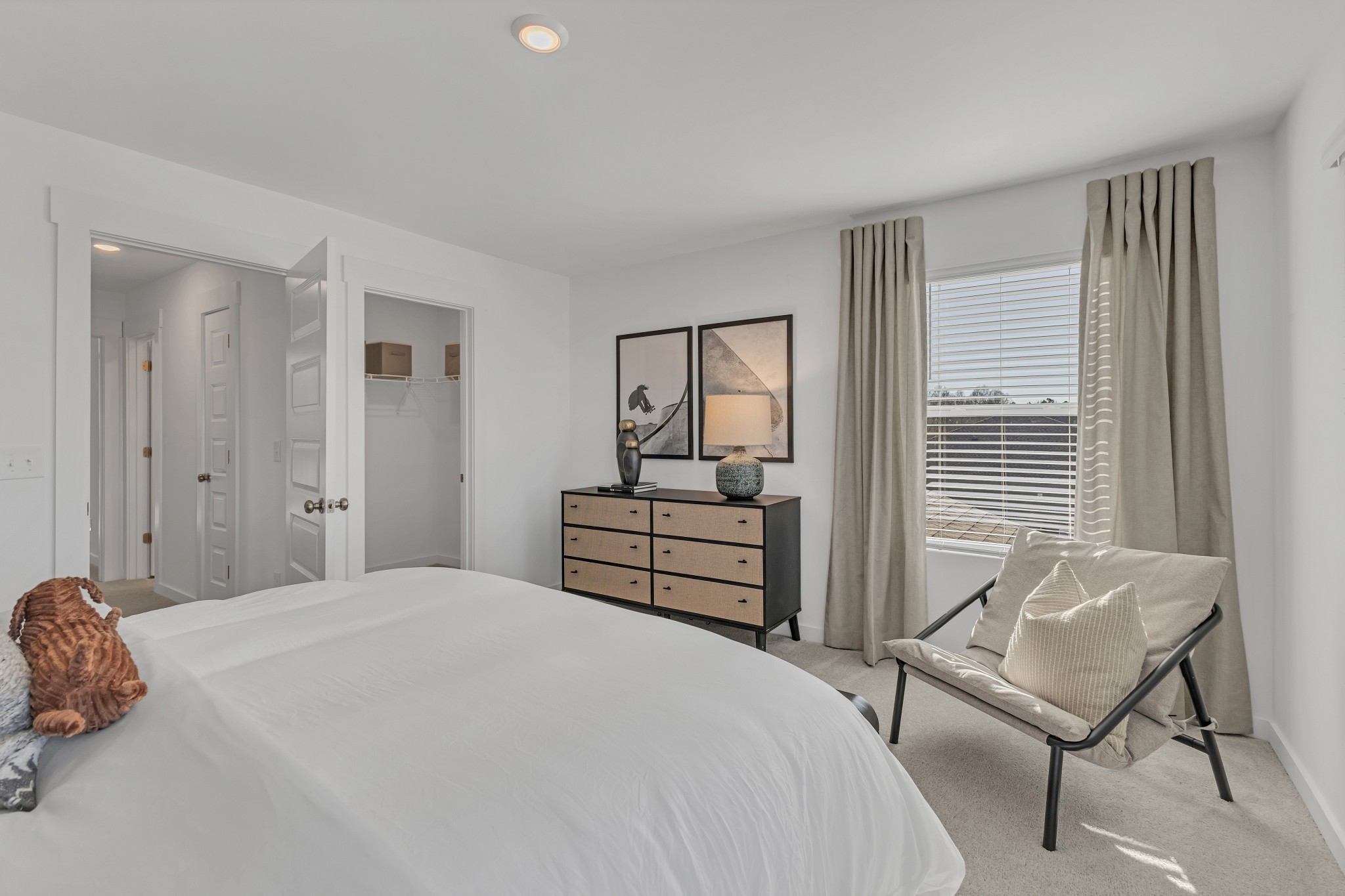 6356 North New Hope Road Hermitage, TN 37076 - Photo 33 of 37 a bedroom with a bed and chair